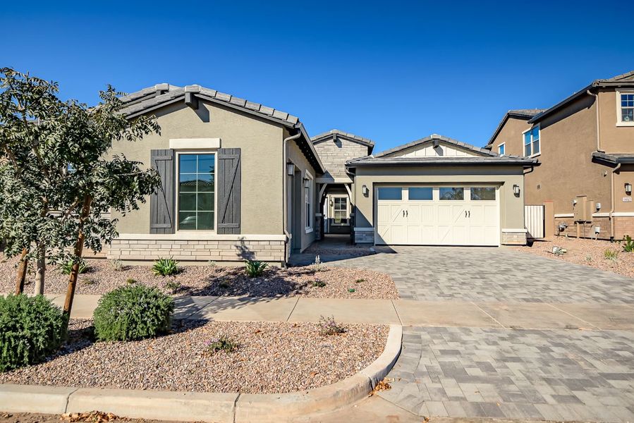 Front exterior of a new home in Elegance at Eastmark, Mesa, AZ, highlighting curb appeal (Image 28).