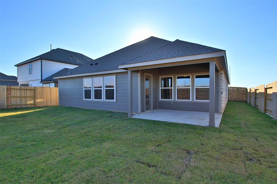 Exterior details and patio area of a home in Oakwood Estates, Waller (Image 20). Exterior details and patio area of a home in Oakwood Estates, Waller (Image 20).
