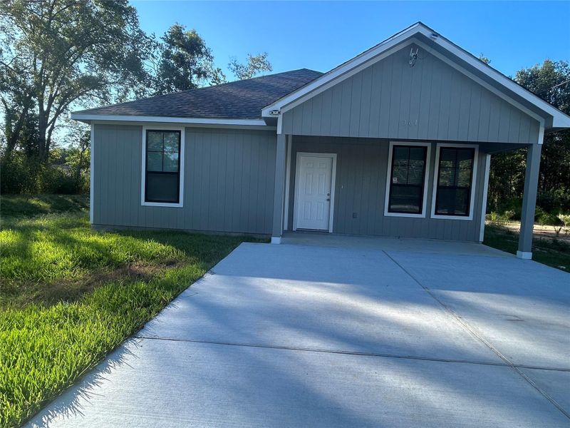 Front exterior of a new home in , Shepherd, TX, highlighting curb appeal (Image 1). Front exterior of a new home in , Shepherd, TX, highlighting curb appeal (Image 1).