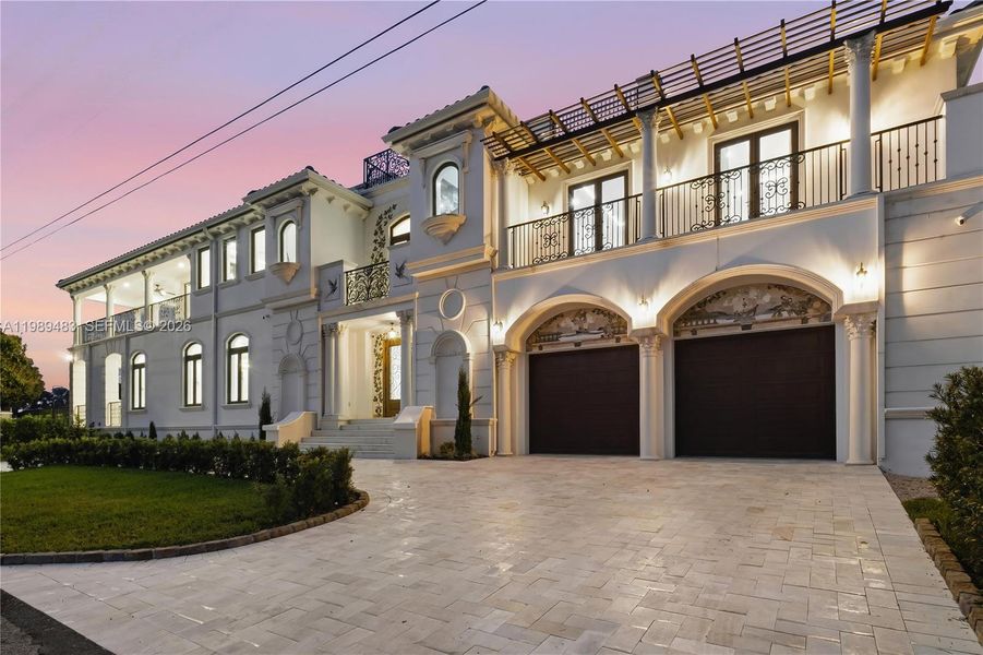 Front exterior of a new home in , Surfside, FL, highlighting curb appeal (Image 32).