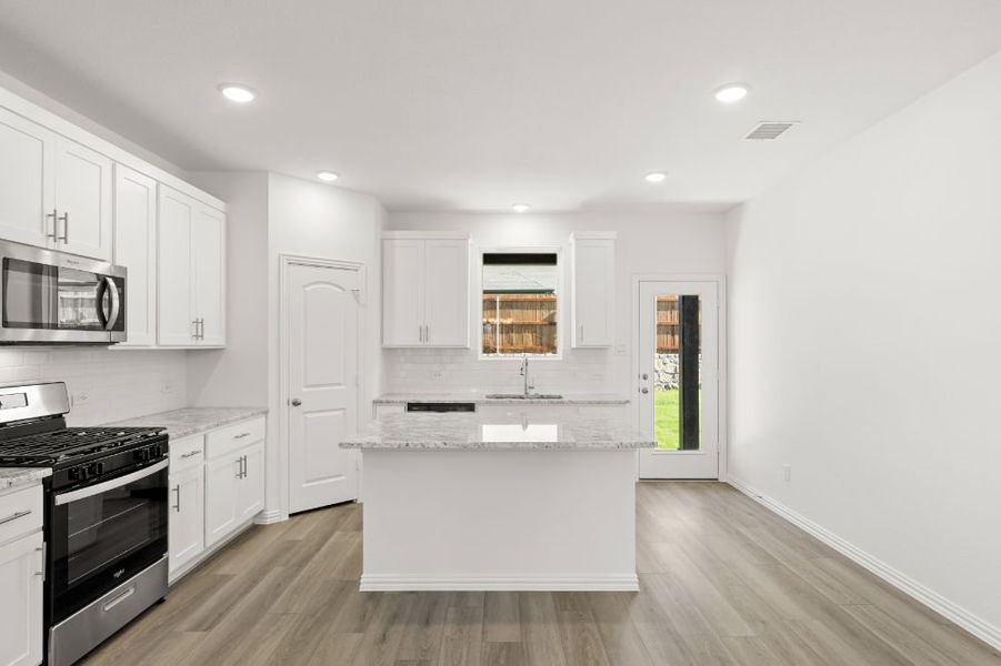 Representative furnished interior of a home built from the Lamar by UnionMain Homes in Reunion, Rhome (Image 8).