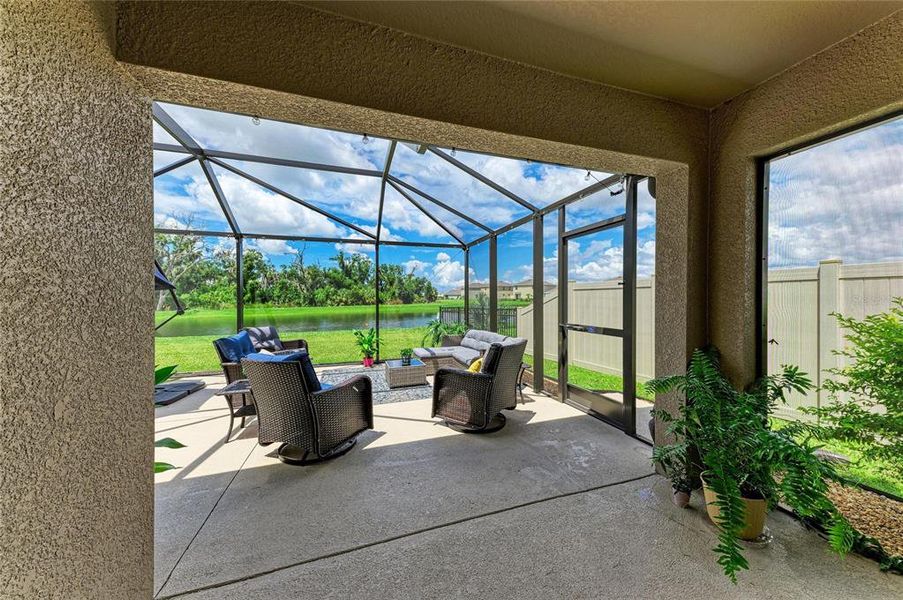 Exterior details and patio area of a home in Bella Lago, Parrish (Image 22).
