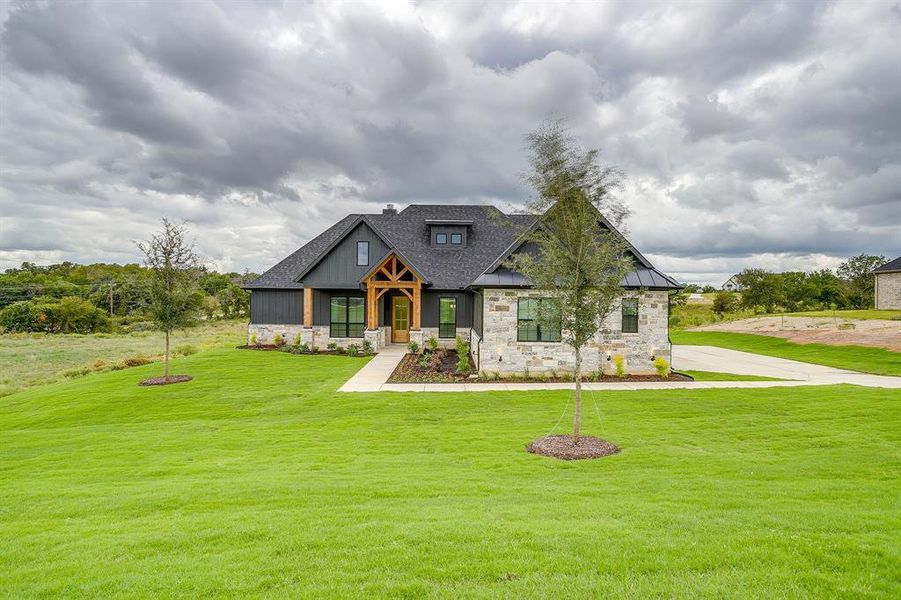 Beautiful new build by VictorE Homebuilders! Set on 1 acre with pretty views!