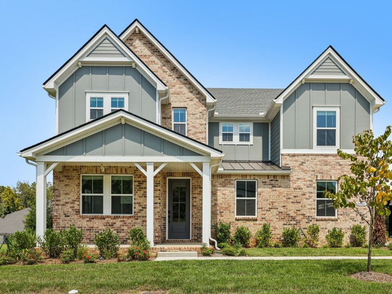 Front exterior of a new home in Station Hill - Estate Series, Franklin, TN, highlighting curb appeal (Image 1). Front exterior of a new home in Station Hill - Estate Series, Franklin, TN, highlighting curb appeal (Image 1).