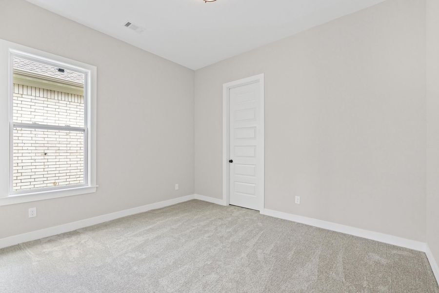 Light gray carpeting complementing neutral wall tones Light gray carpeting complementing neutral wall tones