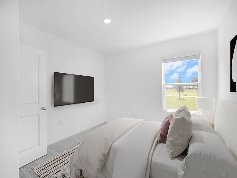 Representative furnished interior of a home built from the Azalea by Taylor Morrison in Palm Wind, Hudson (Image 14).