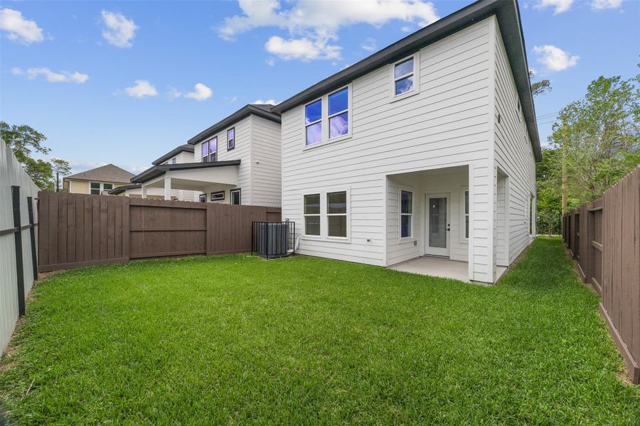 Exterior details and patio area of a home in , Houston (Image 3).