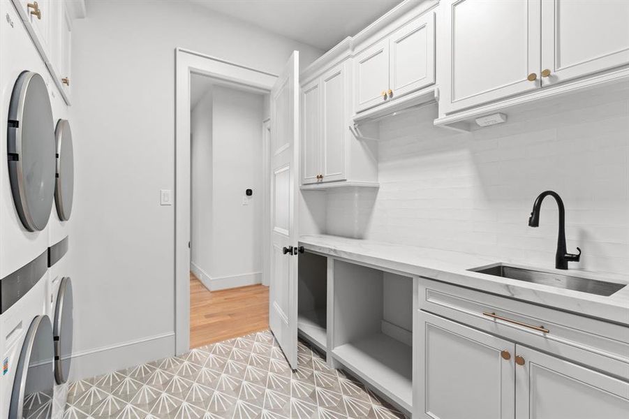 Laundry Room comes equipped with TWO SETS of Washer/Dryer.