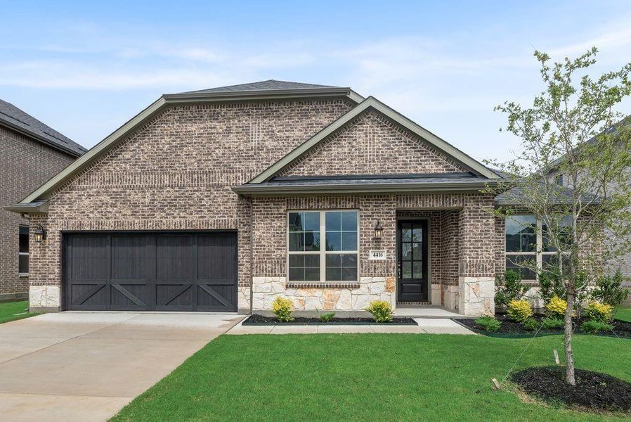 Front exterior of a new home in Sutton Fields, Celina, TX, highlighting curb appeal (Image 18). Front exterior of a new home in Sutton Fields, Celina, TX, highlighting curb appeal (Image 18).