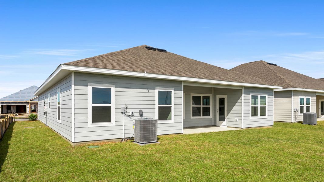 Exterior details and patio area of a home in Hodges Bayou Plantation, Panama City (Image 3).