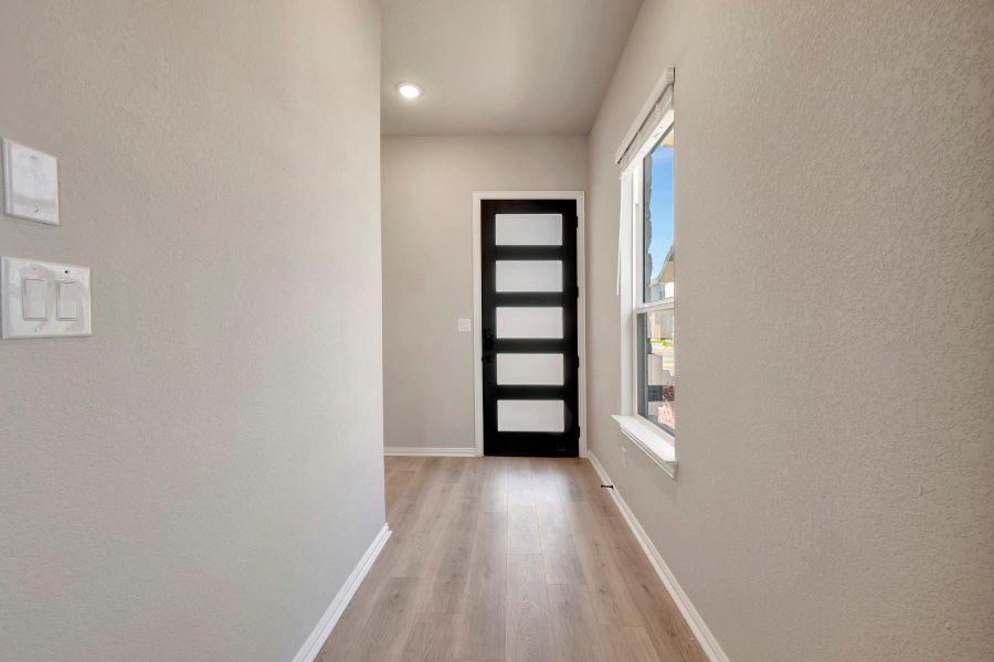 Spacious, unfurnished interior of a new home in Heritage, Dripping Springs (Image 28).