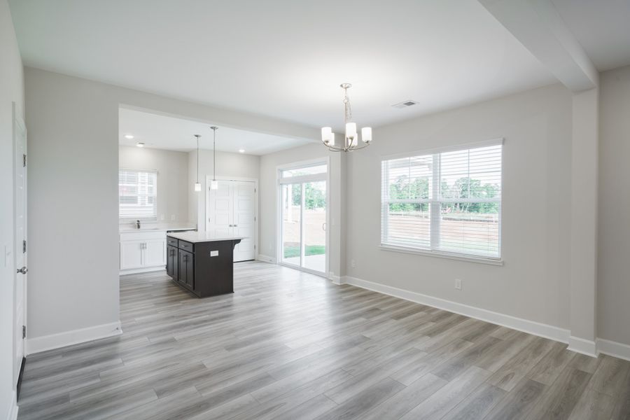 Representative unfurnished interior of a home built from the The Holland by Cothran Homes in Holly Ridge, Greenville (Image 14).