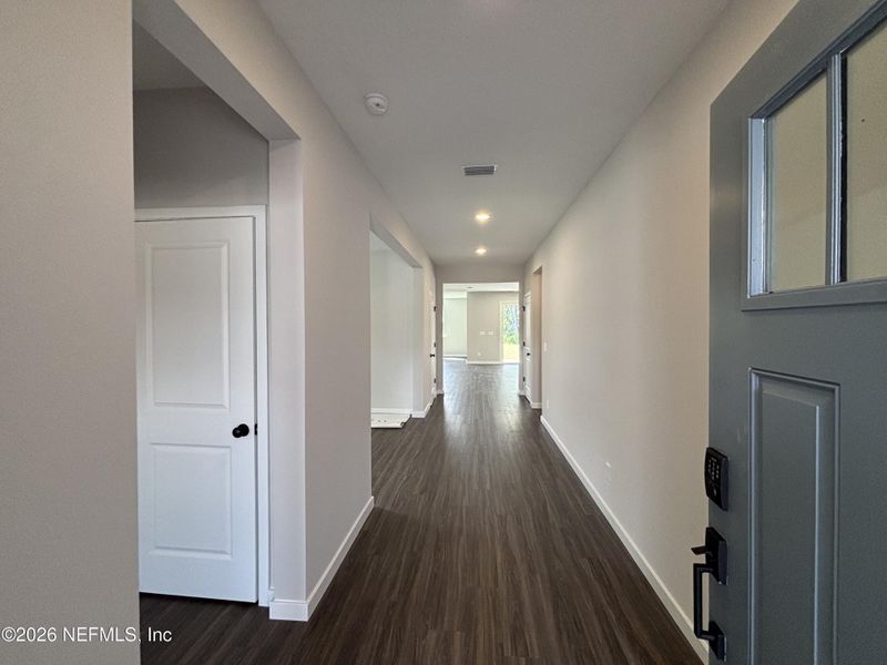 Spacious, unfurnished interior of a new home in The Cypress Series at Reserve East, Flagler Beach (Image 25).