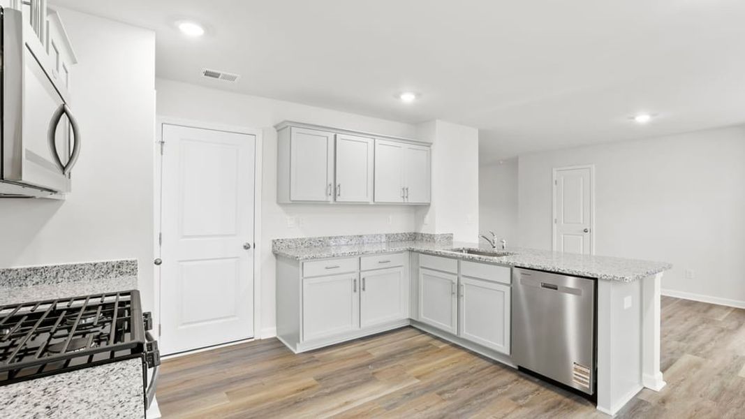 Furnished interior view inside a new home in Varner Station, Woodruff (Image 9).