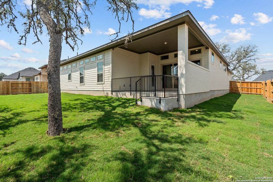 Front exterior of a new home in Mesa Western, Cibolo, TX, highlighting curb appeal (Image 20).