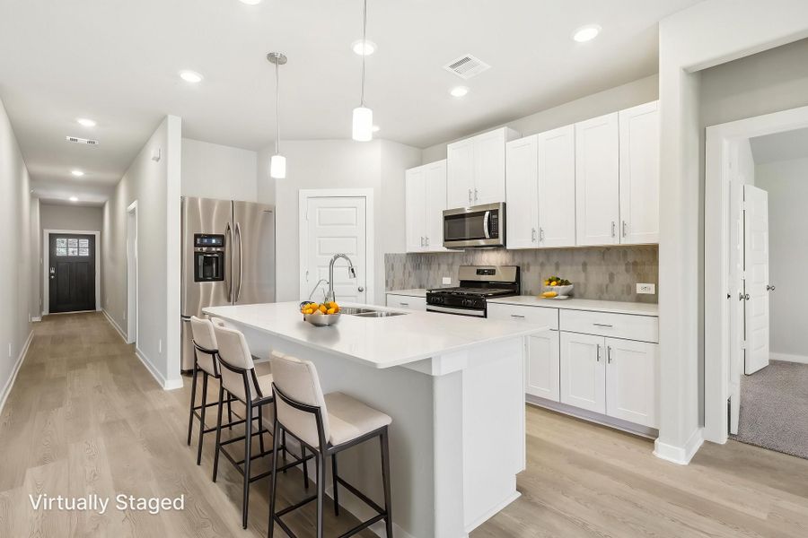 Furnished interior view inside a new home in Heights of Barbers Hill, Baytown (Image 5).