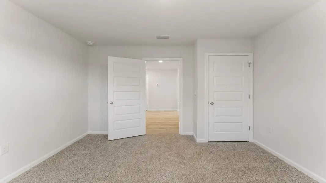 Spacious, unfurnished interior of a new home in Magnolia at the Bluffs Phase 3, Freeport (Image 22). Spacious, unfurnished interior of a new home in Magnolia at the Bluffs Phase 3, Freeport (Image 22).