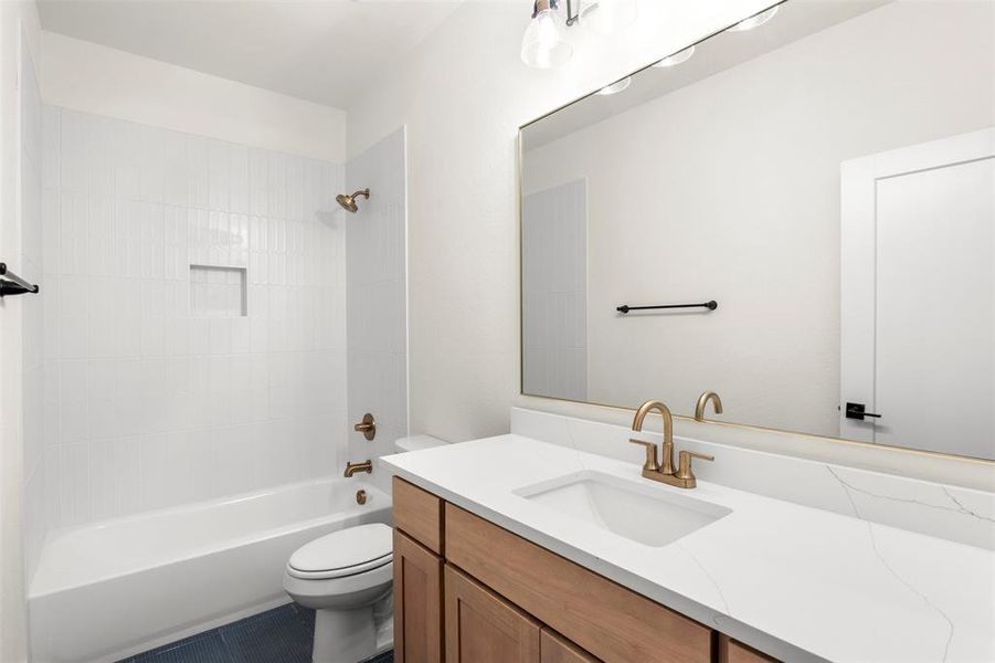 Bathroom with vanity and shower / bathtub combination