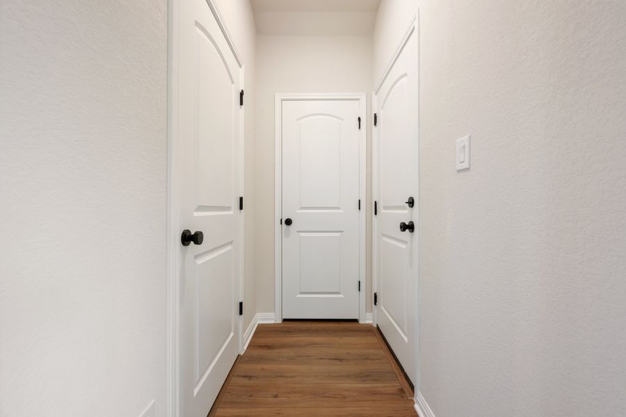 Representative unfurnished interior of a home built from the Robin by Ashton Woods in The Cottages at Lariat, Liberty Hill (Image 35). Representative unfurnished interior of a home built from the Robin by Ashton Woods in The Cottages at Lariat, Liberty Hill (Image 35).