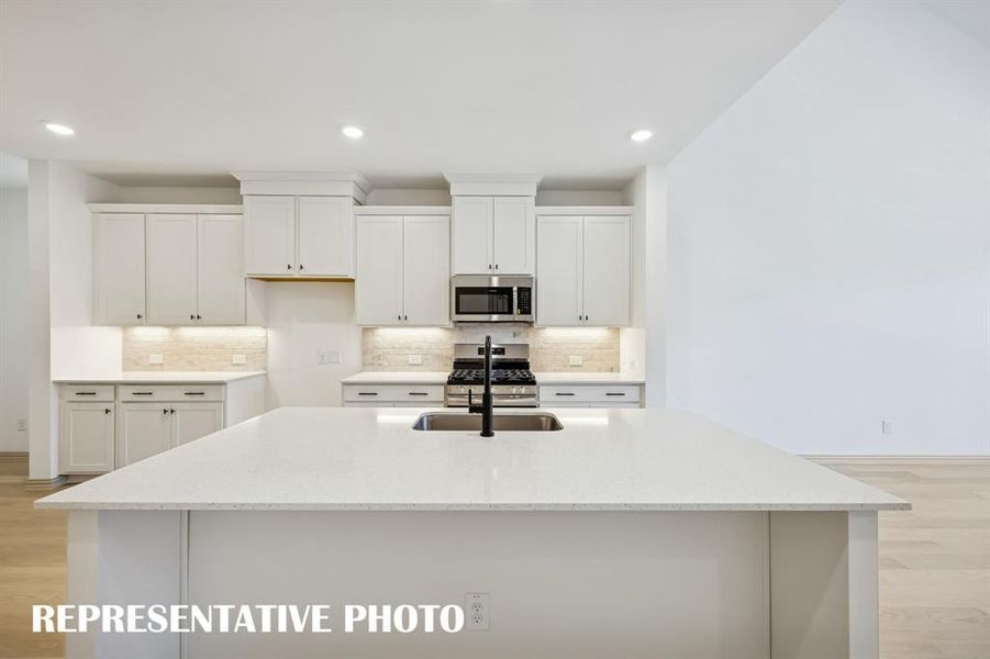 Your new kitchen island is the perfect gathering place for friends and family!  REPRESENTATIVE PHOTO