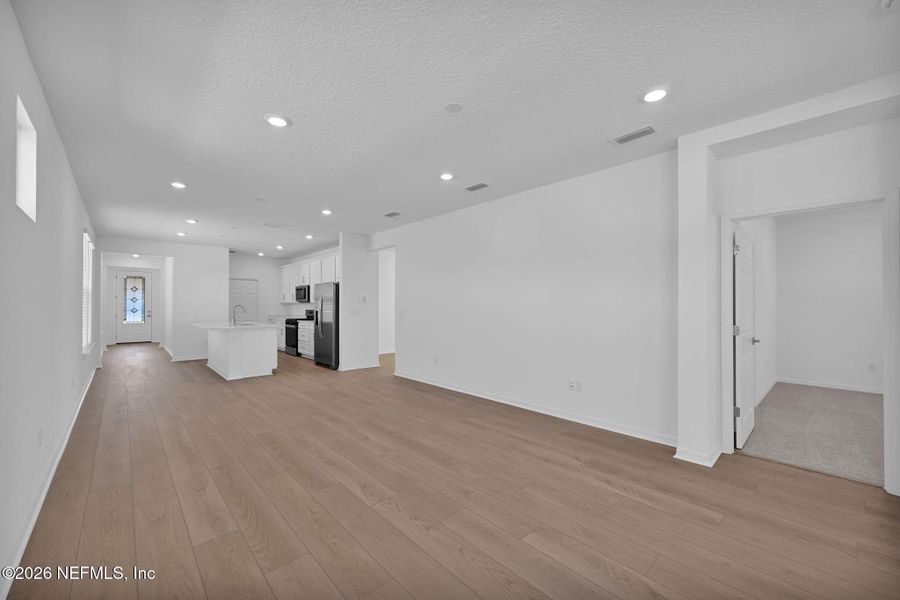 Spacious, unfurnished interior of a new home in Del Webb Wildlight, Yulee (Image 14).