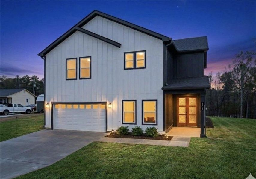 Front exterior of a new home in , Jefferson, GA, highlighting curb appeal (Image 28).