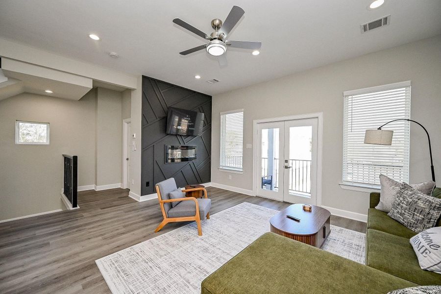 Bright and airy living room with modern finishes and an open, welcoming layout.