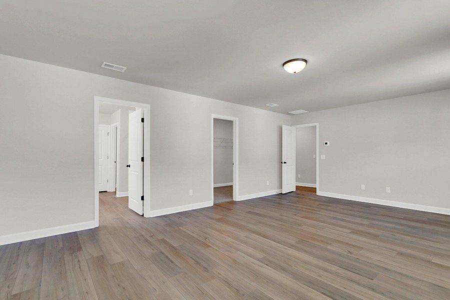 Spacious, unfurnished interior of a new home in Tea Farm: Presidents Series, Ravenel (Image 37).