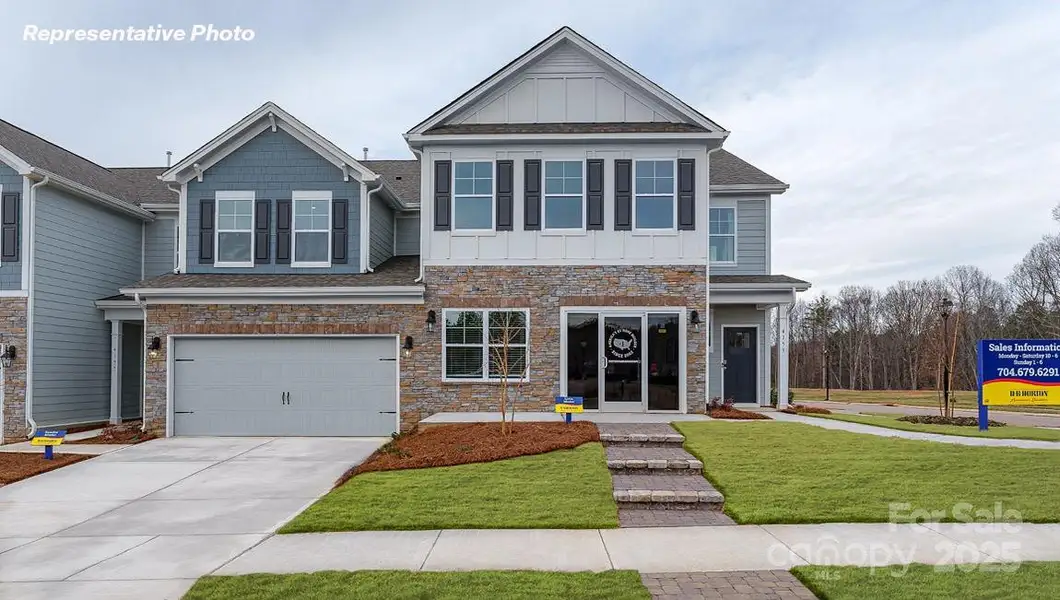 Front exterior of a new home in Blackstone Bay Townhomes, Sherrills Ford, NC, highlighting curb appeal (Image 1).