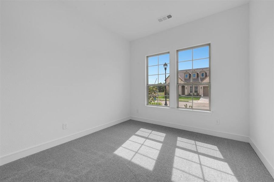 Spacious, unfurnished interior of a new home in Wellington, Haslet (Image 21).