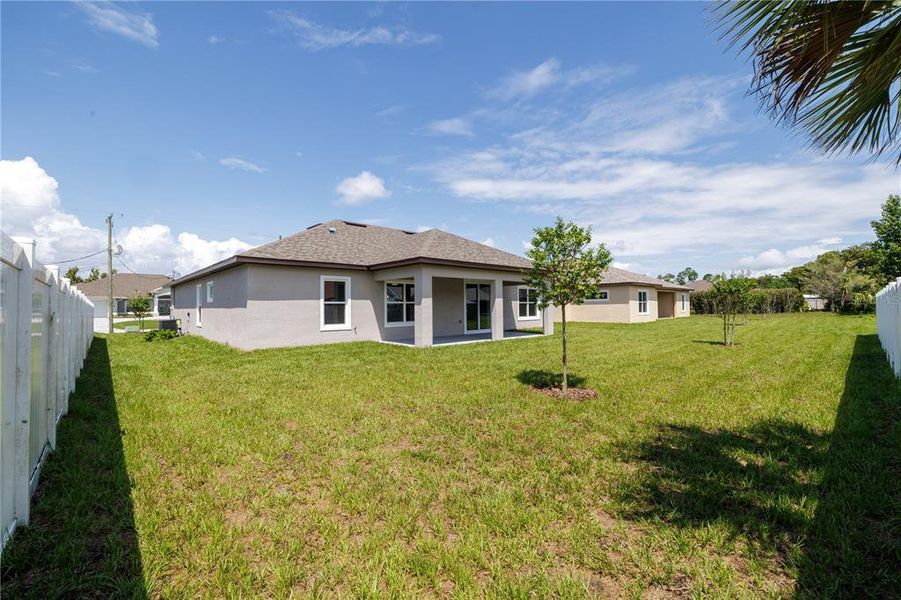Exterior details and patio area of a home in , Palm Coast (Image 24).