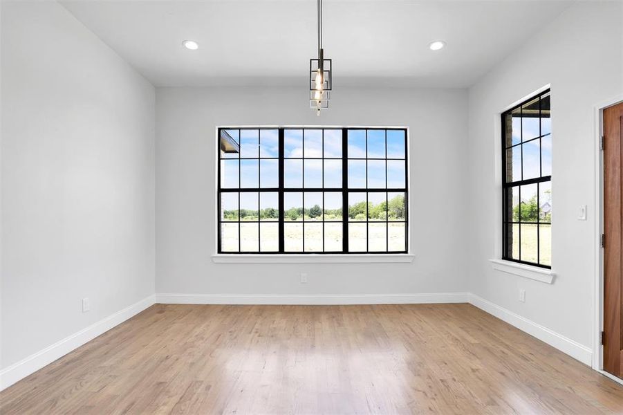 Empty room featuring light hardwood / wood-style flooring