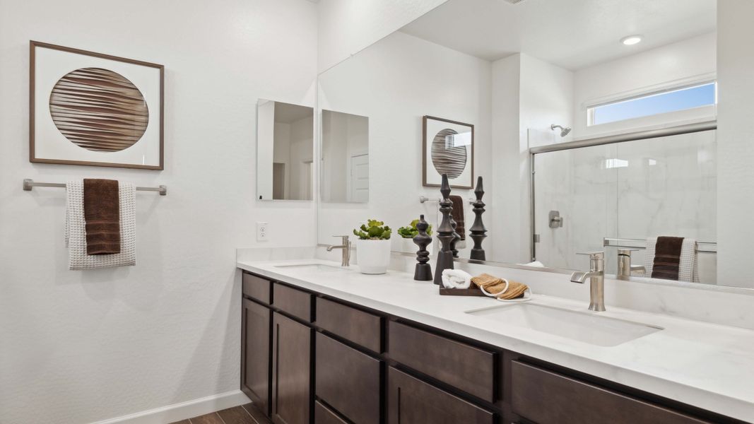Representative furnished interior of a home built from the Mockingbird by D.R. Horton in Apache Farms, Buckeye (Image 24).