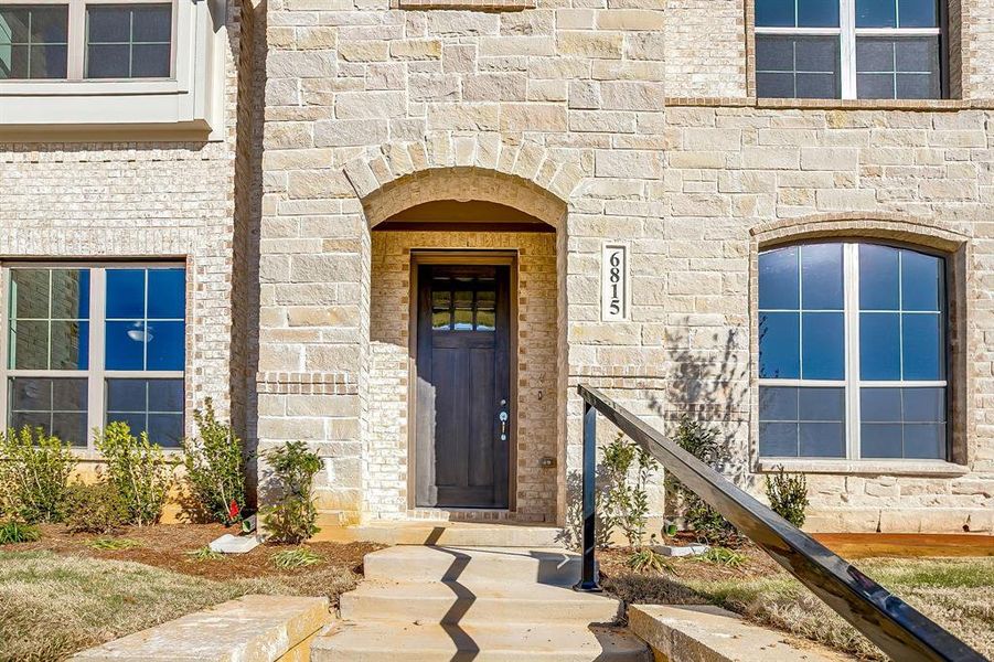 Exterior details and patio area of a home in Knight's Landing on Eden Road, Arlington (Image 3).