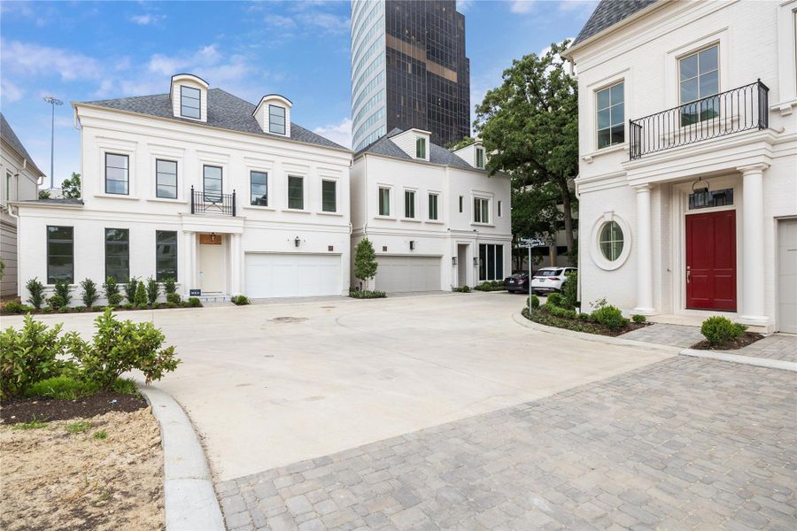 Each home is thoughtfully designed and pre-wired for EV chargers, elevators, and water softening systems to cater to modern conveniences and sustainability needs. In addition, standard low-voltage and security pre-wires are included to offer further customization options. Residents can enjoy the convenience and peace of mind provided by the two-car private garages, complete with Liftmaster battery backup systems for added security and reliability. Each home is thoughtfully designed and pre-wired for EV chargers, elevators, and water softening systems to cater to modern conveniences and sustainability needs. In addition, standard low-voltage and security pre-wires are included to offer further customization options. Residents can enjoy the convenience and peace of mind provided by the two-car private garages, complete with Liftmaster battery backup systems for added security and reliability.