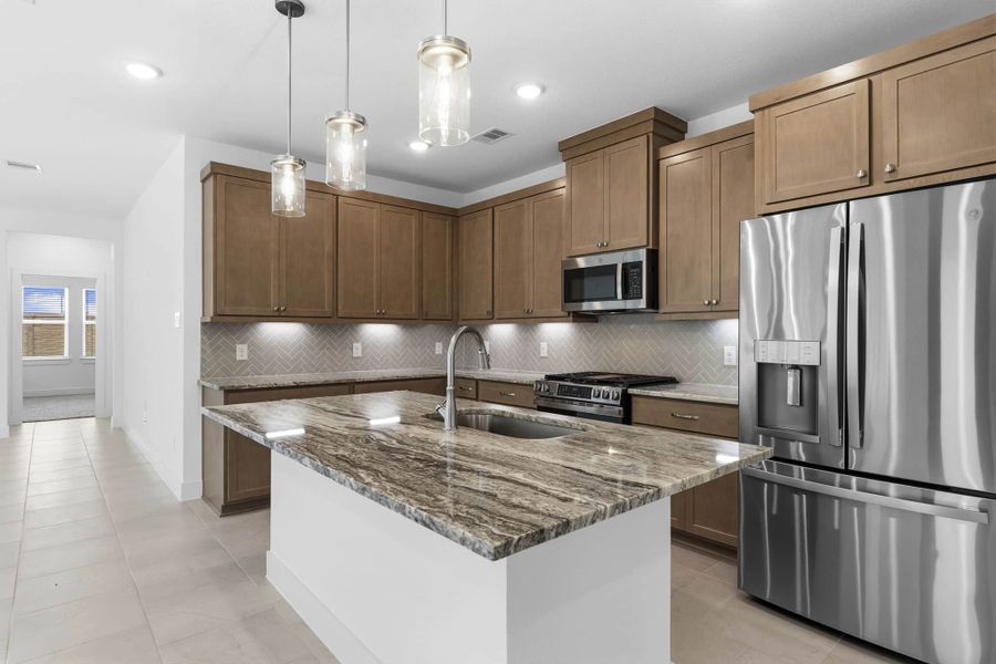 Furnished interior view inside a new home in Meridiana, Manvel (Image 5).