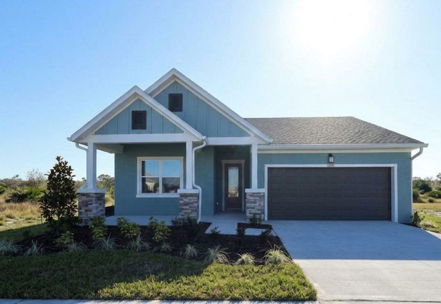 Representative exterior photo of a completed home built from the The Northglen by David Weekley Homes in Waterset Tradition Series, Apollo Beach, FL (Image 2). Representative exterior photo of a completed home built from the The Northglen by David Weekley Homes in Waterset Tradition Series, Apollo Beach, FL (Image 2).