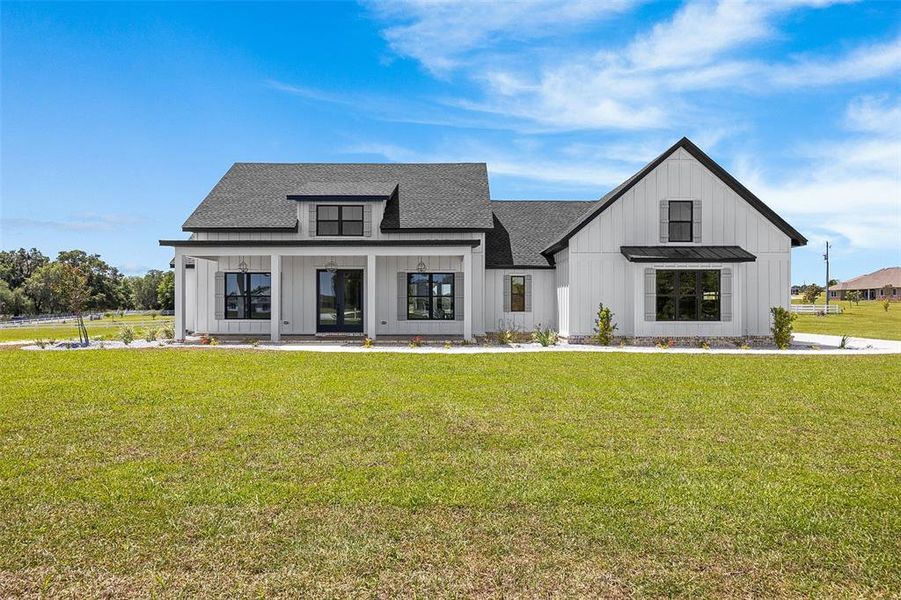 Front exterior of a new home in , Lake City, FL, highlighting curb appeal (Image 26).