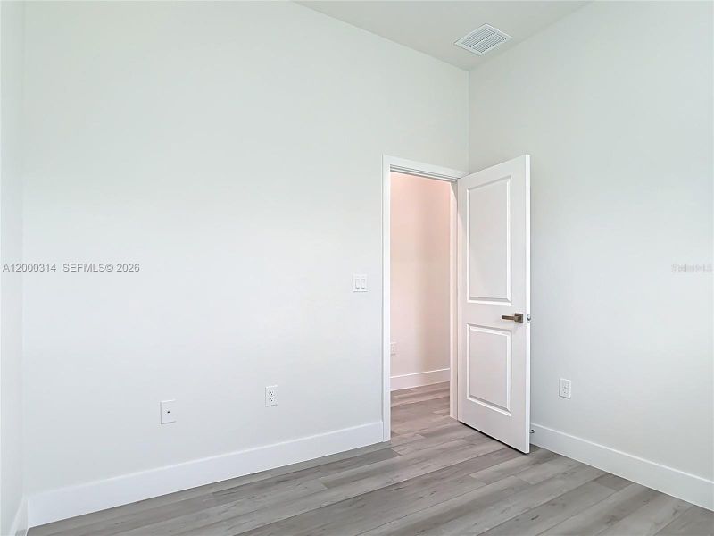 Spacious, unfurnished interior of a new home in , Port Charlotte (Image 26).