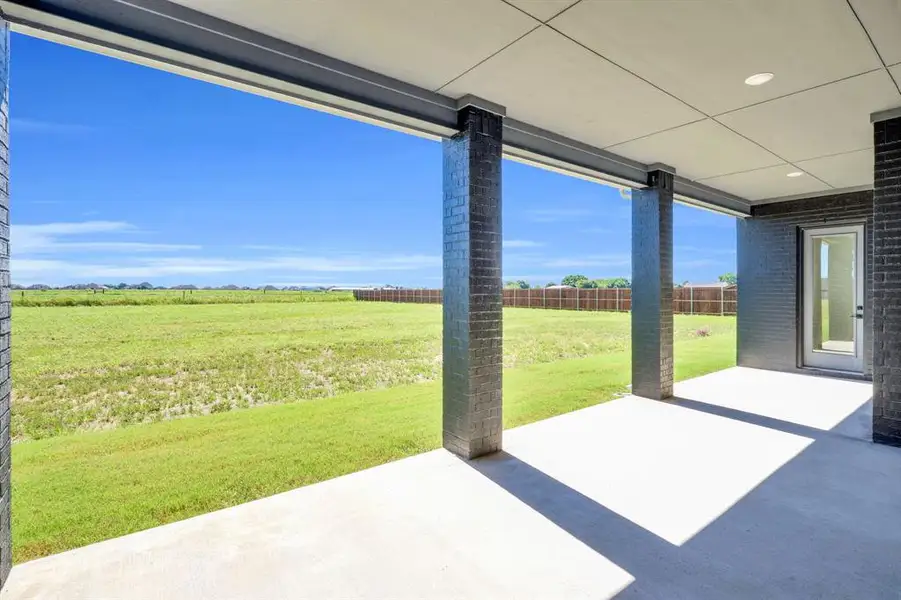Exterior details and patio area of a home in Springside Estates II, Waxahachie (Image 4). Exterior details and patio area of a home in Springside Estates II, Waxahachie (Image 4).