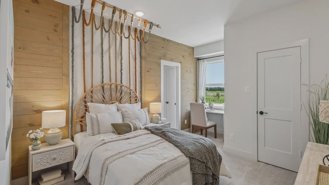 Furnished interior view inside a new home in Meridiana Chateau, Manvel (Image 19).