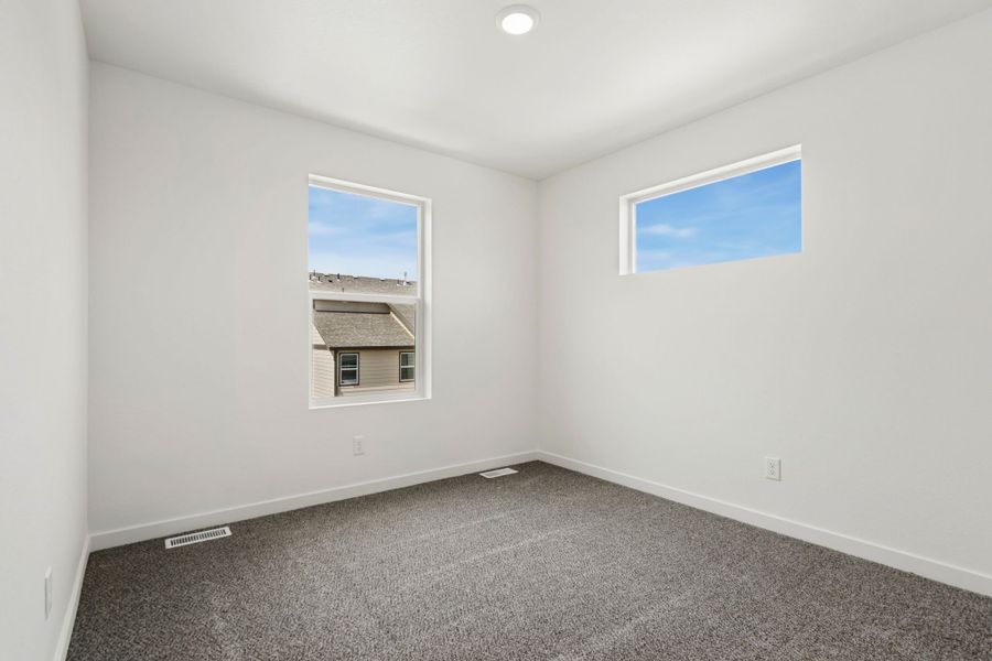 Spacious, unfurnished interior of a new home in Union Colony West, Greeley (Image 16).