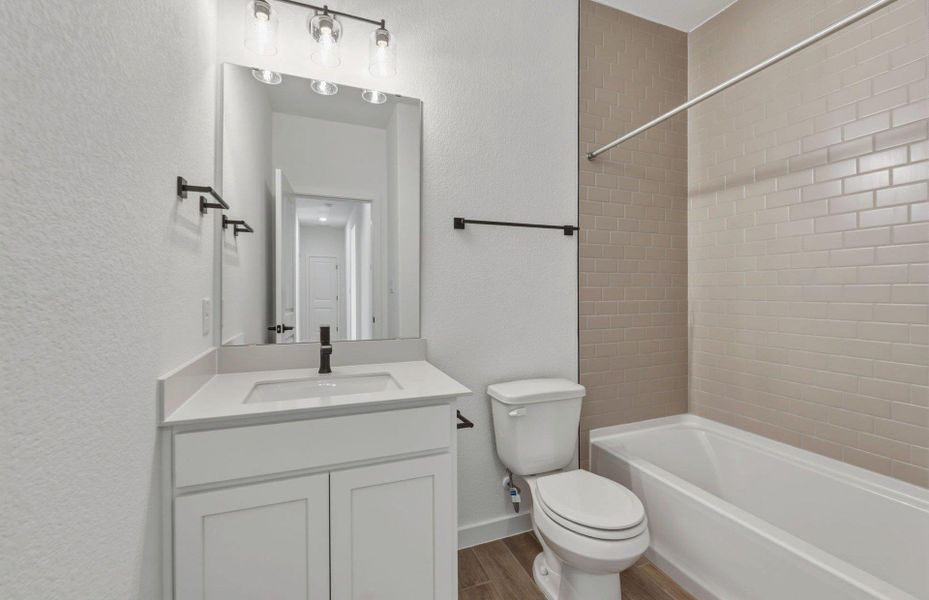 Furnished interior view inside a new home in Wolf Ranch, Georgetown (Image 10).