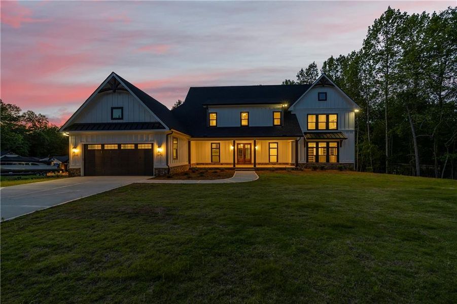 Front exterior of a new home in , Flowery Branch, GA, highlighting curb appeal (Image 55).