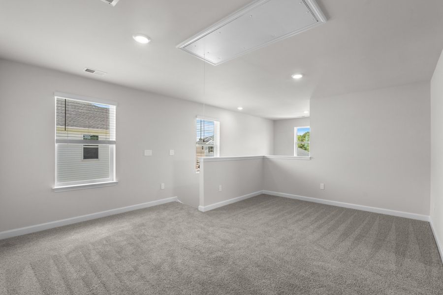 Spacious, unfurnished interior of a new home in Cypress Ridge - The Boardwalk Series, Longs (Image 26).