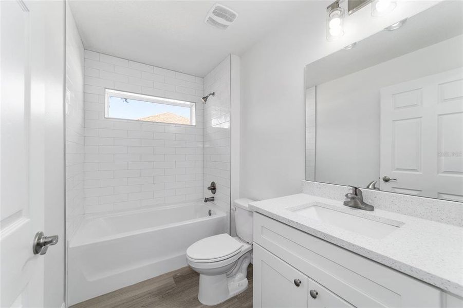 Furnished interior view inside a new home in , Dunnellon (Image 11).