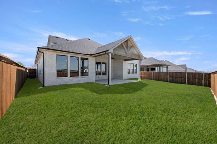 Exterior details and patio area of a home in Rio Vista at Kelly Ranch, Aledo (Image 27).