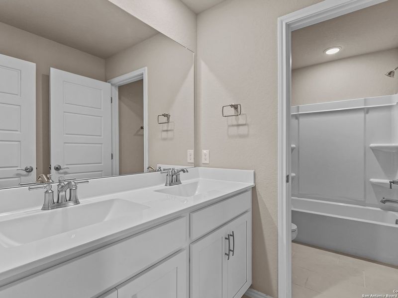 Furnished interior view inside a new home in Royal Crest, San Antonio (Image 14).