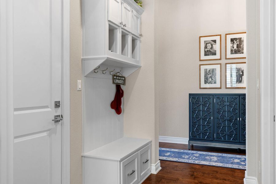 The functional mud area adds convenient everyday organization just off the garage. The functional mud area adds convenient everyday organization just off the garage.