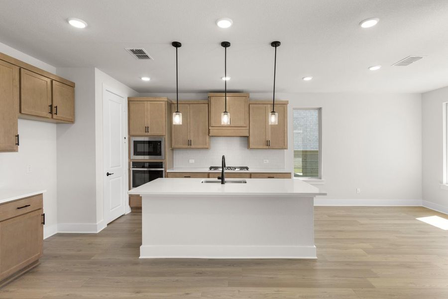 Furnished interior view inside a new home in Union Park, Little Elm (Image 7).